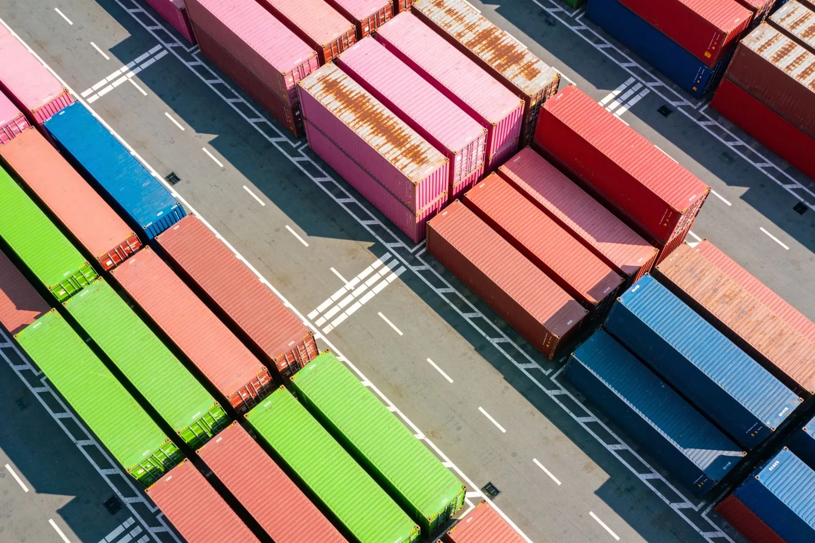 Aerial view of a container terminal with stacked boxes.